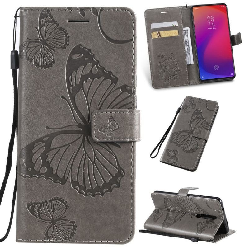 Etui Folio Xiaomi Mi 9T / Mi 9T Pro Jasnoniebieski Pomarańczowy Gigantyczne Motyle Stringi Etui Ochronne