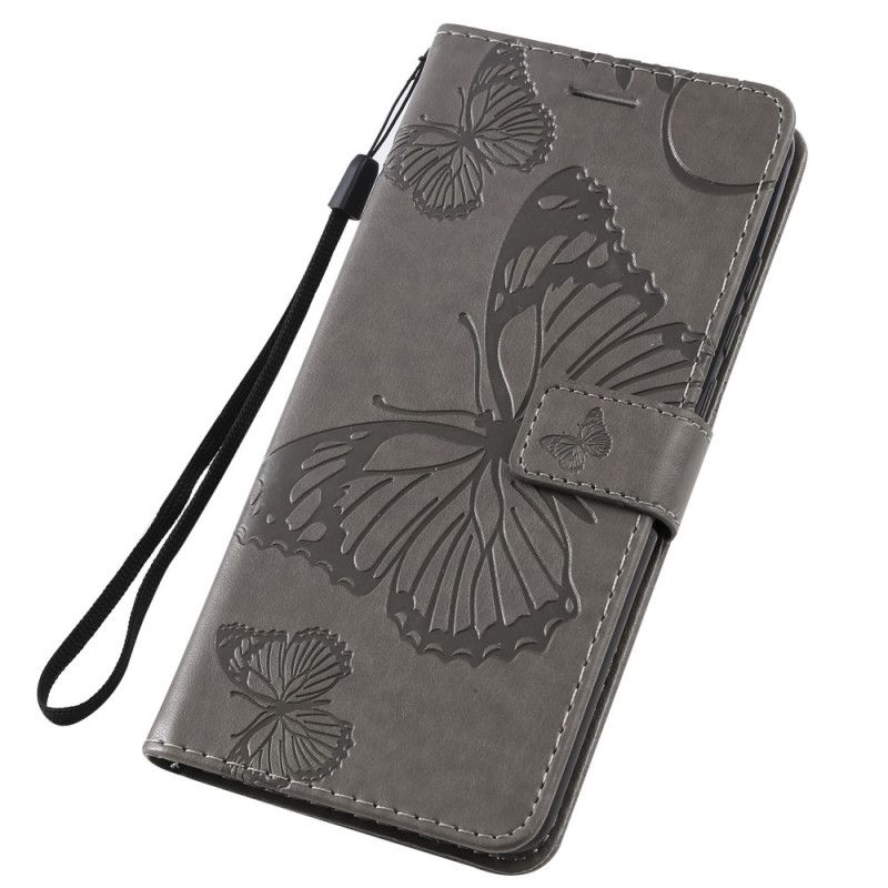 Etui Folio Xiaomi Mi 9T / Mi 9T Pro Jasnoniebieski Pomarańczowy Gigantyczne Motyle Stringi Etui Ochronne