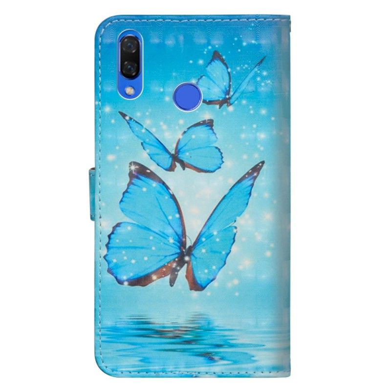 Etui Folio Honor 8X Latające Niebieskie Motyle