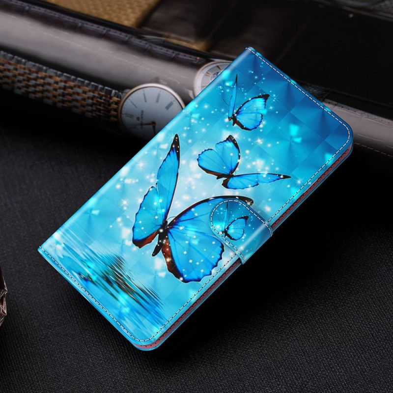 Etui Folio Samsung Galaxy S21 5G Latające Niebieskie Motyle