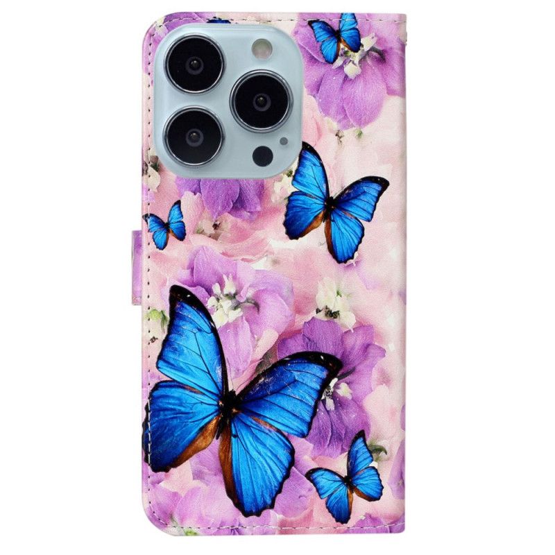 Etui Folio Do iPhone 16 Pro Max Motyle I Fioletowe Kwiaty Z Paskiem