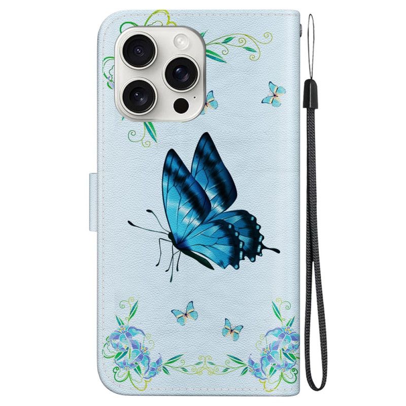 Etui Folio iPhone 16 Pro Max Niebieski Motyl I Kwiaty Z Paskiem Etui Ochronne