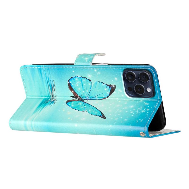 Etui Folio iPhone 16 Pro Max Niebieski Motyl Na Wodzie Z Paskiem Etui Ochronne