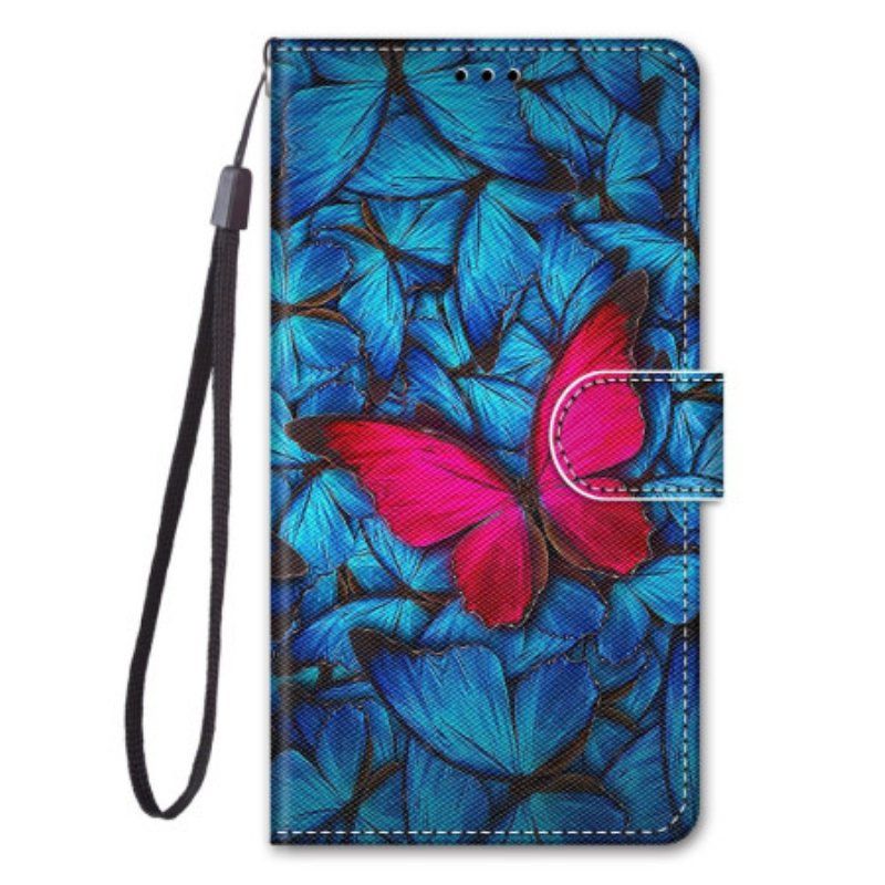 Etui Folio do Samsung Galaxy S23 Ultra 5G Czerwony Motyl Niebieskim Tle