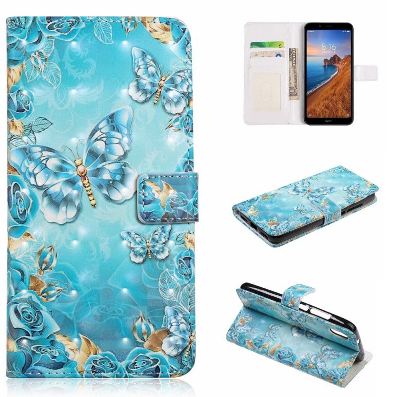 Etui Folio Xiaomi Redmi 7A Motyle I Kwiaty Na Niebieskim Tle