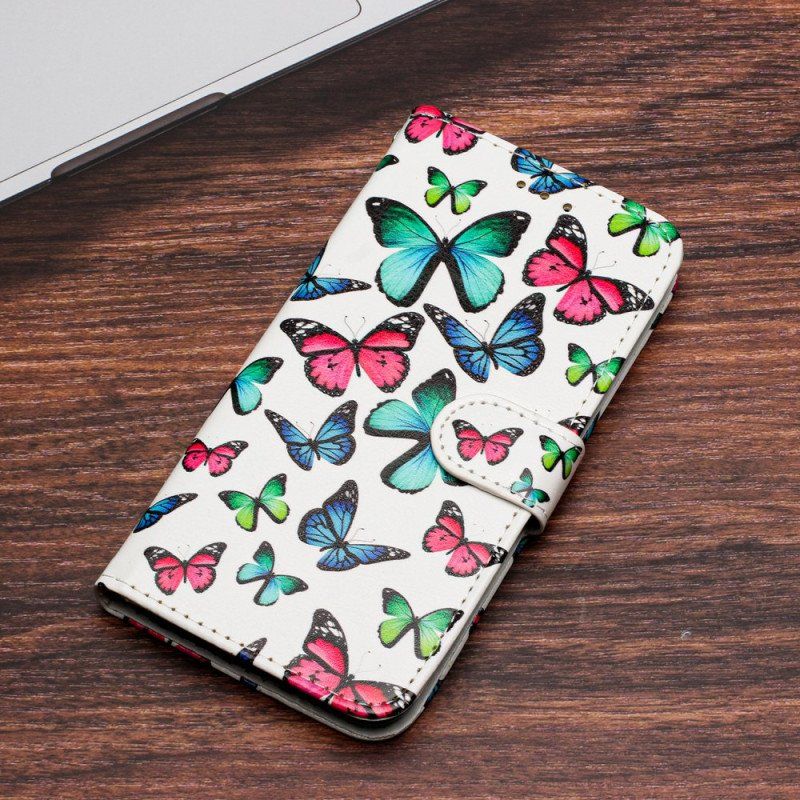 Etui Folio do Google Pixel 7A z Łańcuch Motyle W Locie Z Paskiem