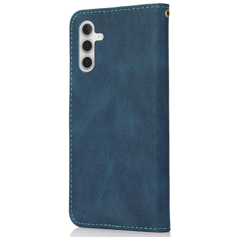 Etui Folio do Samsung Galaxy A13 5G / A04s Dwukolorowa Trójkątna Sztuczna Skóra