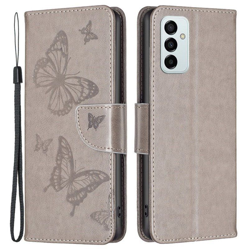 Etui Folio do Samsung Galaxy M23 5G z Łańcuch Paski Z Nadrukiem Motyli