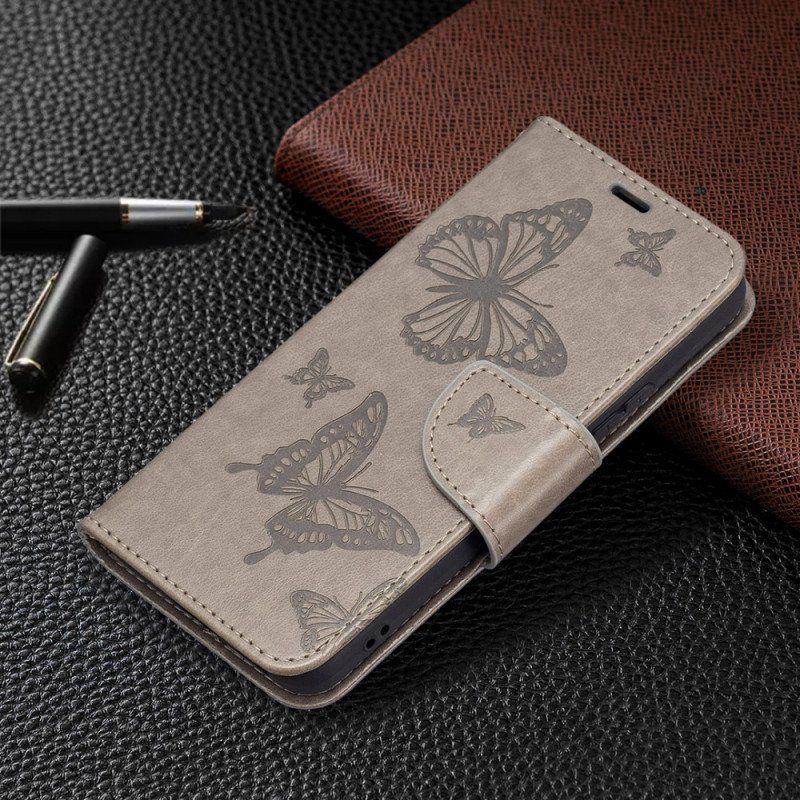 Etui Folio do Samsung Galaxy S22 5G Motyle W Locie Z Smyczą