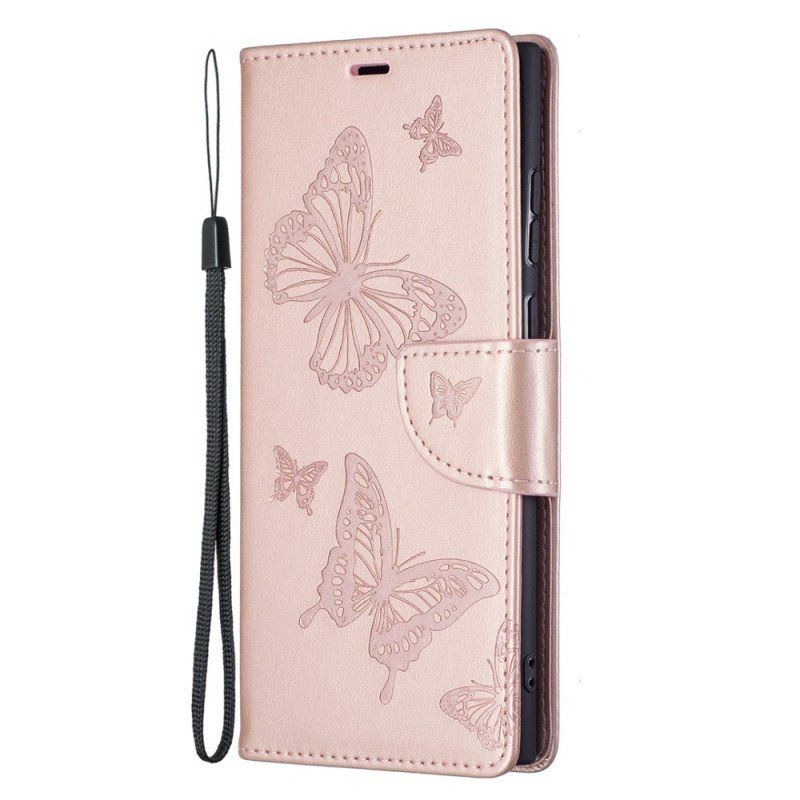 Etui Folio do Samsung Galaxy S22 Ultra 5G Motyle W Locie Z Smyczą