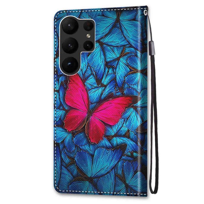 Etui Folio do Samsung Galaxy S23 Ultra 5G Czerwony Motyl Niebieskim Tle