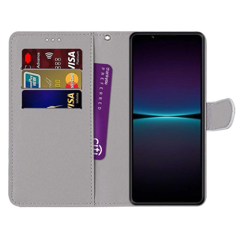 Etui Folio do Sony Xperia 1 IV Czerwony Motyl Niebieskim Tle