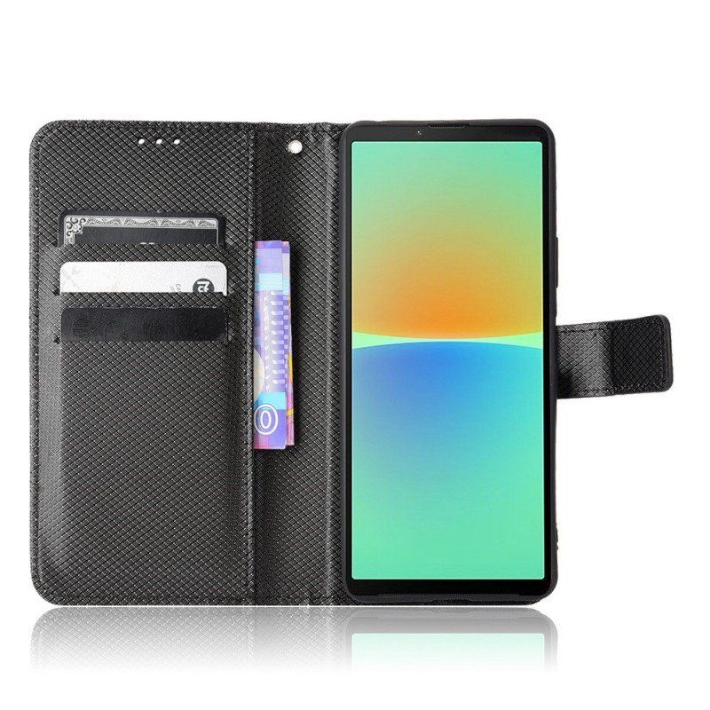 Etui Folio do Sony Xperia 10 IV z Łańcuch Stylowa Sztuczna Skóra Z Paskami