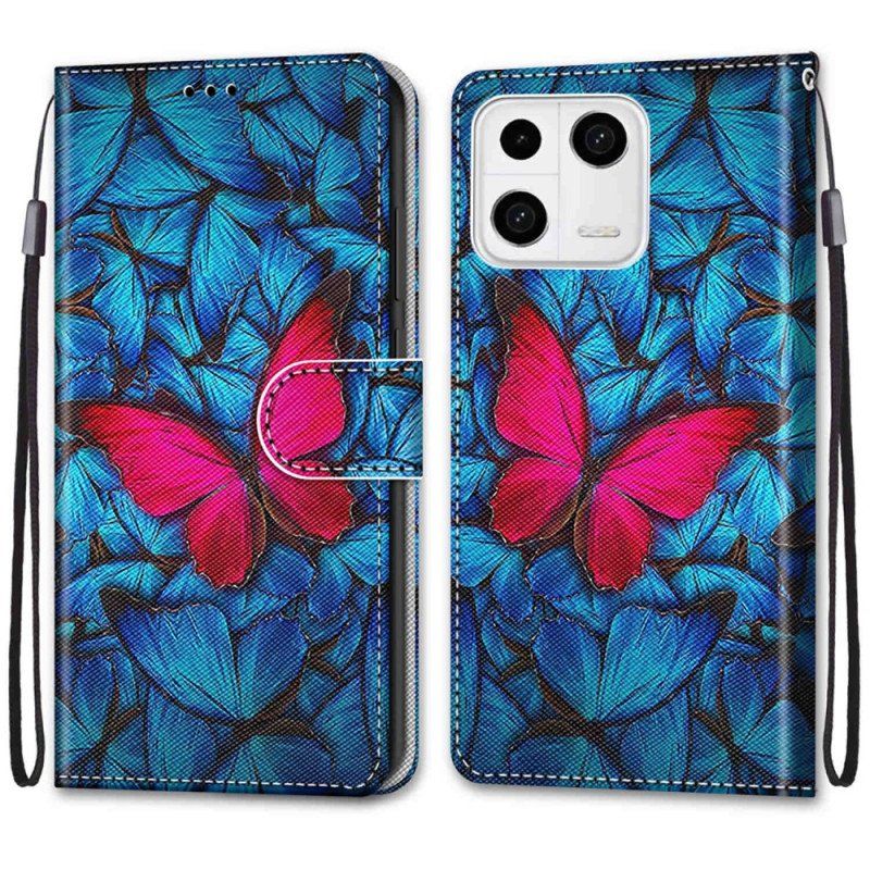 Etui Folio do Xiaomi 13 Czerwony Motyl Niebieskim Tle