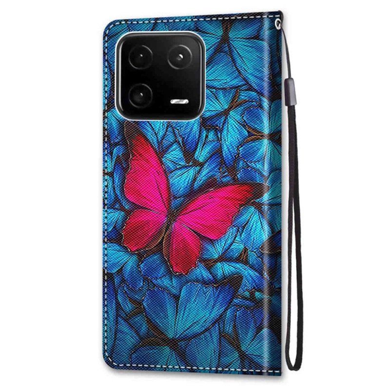 Etui Folio do Xiaomi 13 Pro Czerwony Motyl Niebieskim Tle