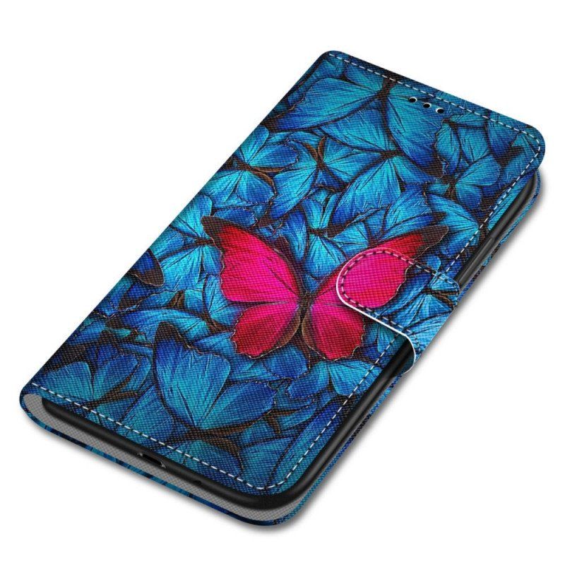 Etui Folio do Xiaomi Redmi Note 11 Pro Plus 5G Czerwony Motyl Niebieskim Tle